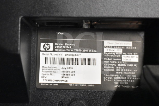 Close-up of a label on an HP Model L1710 17-inch LCD color monitor, detailing specifications and serial number.