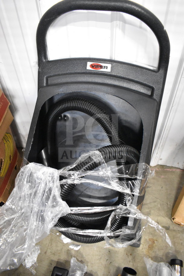Brand new Viper Shovelnose Wet/Dry Vacuum Handle, with minor scratches. Labeled "Viper," wrapped in plastic.