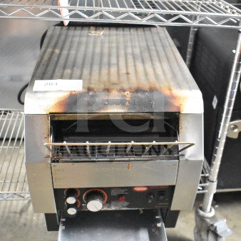 Hatco TQ-800HBA commercial countertop conveyor toaster oven. Visible wear, 208 volts, 1 phase. Model TQ-800HBA tag shown.