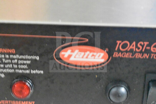 Hatco TQ-800HBA countertop conveyor toaster oven, 208 volts, 1 phase, with visible Hatco logo and control buttons.