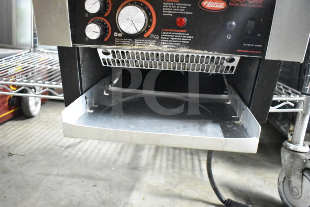 Hatco TQ-800HBA conveyor toaster oven, 208V, 1 phase, commercial countertop model with control knobs and visible branding.