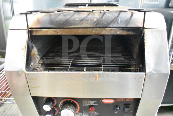Hatco TQ-800HBA commercial conveyor toaster oven, used condition, 208 volts, 1 phase, visible controls and warning label.