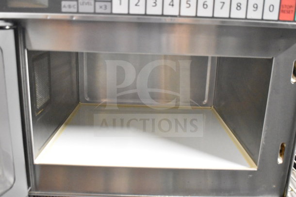 Panasonic NE-17523 Commercial Microwave, stainless steel, digital controls, 230V, 1 phase, open door interior view.