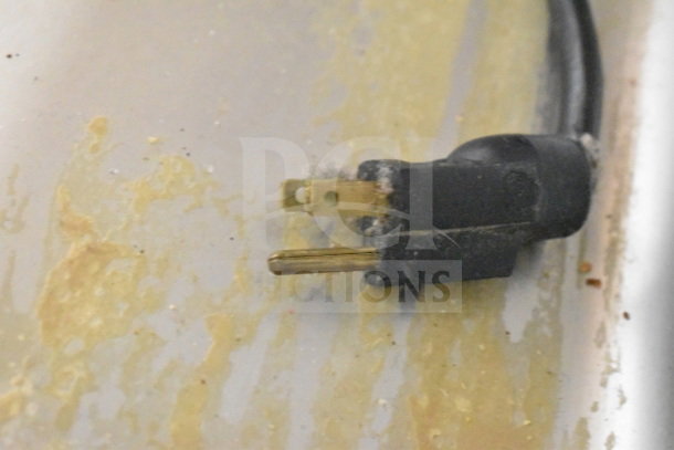 APW Wyott CW-2Ai countertop food warmer plug and cord, 120 volts, 1 phase, showing some wear.