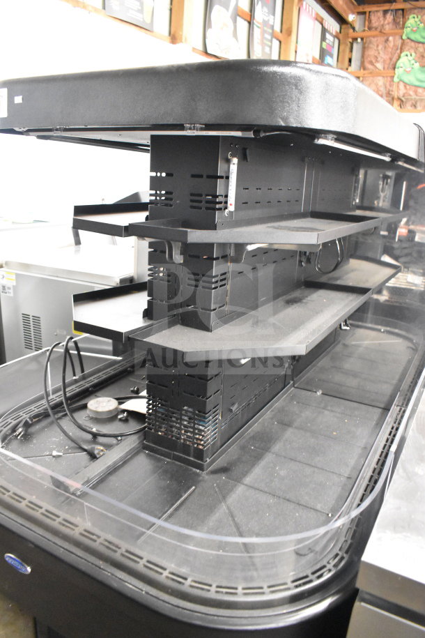 Federal Commercial Floor Style Island Grab N Go Merchandiser with three shelves, sturdy black metal frame, minor wear visible.