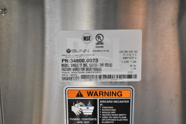 2018 Bunn SINGLE TF DBC coffee machine label, showing model, voltage (120/208-240V), and warning notice.