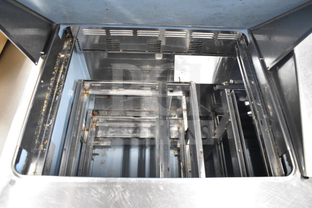 2017 Delfield D4472N-30M prep table interior, showing six drawers. Used condition, stainless steel, 115V, 1 phase.