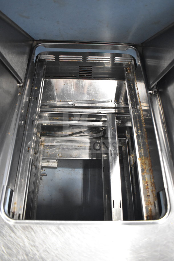 2017 Delfield D4472N-30M Sandwich Prep Table, stainless steel, interior view, visible wear, 6 drawers, 115V, 1 phase.