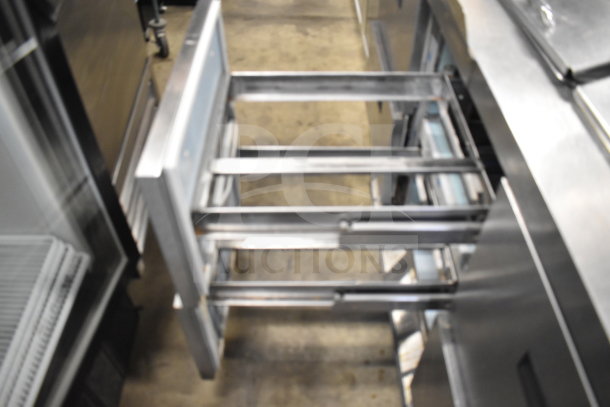 2017 Delfield D4472N-30M sandwich salad prep table with open drawer. 6-drawer mega top, 115V, 1-phase.