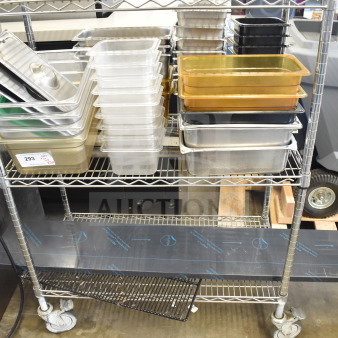 Two-tier metal cart with assorted plastic and metal drop-in bins in various sizes, auction tag #293 visible.
