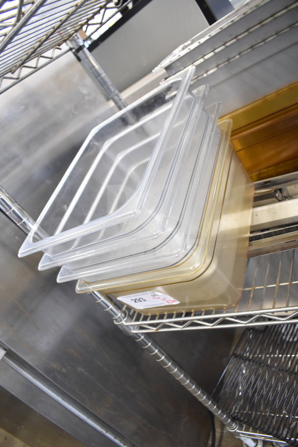 Two-tier shelf with stack of clear and amber drop-in bins, visible tag labeled "283."