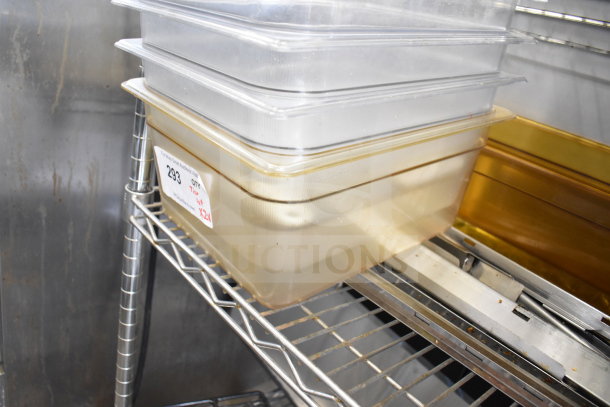 Two-tier lot with clear and gold drop-in bins on metal shelving. Label reads "293, Qty, Tier Lot, X2V."