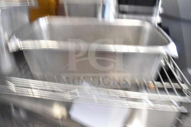 Two-tier lot featuring drop-in bins on wire shelving, stainless steel finish, suitable for storage or organization.