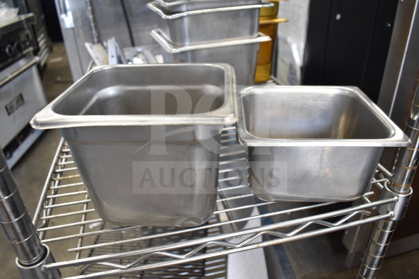 Two stainless steel drop-in bins on a metal shelf. Bins show slight wear, suitable for commercial kitchen use.
