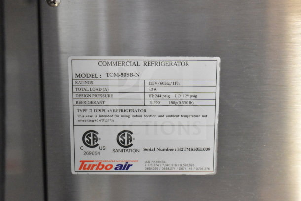Turbo Air TOM-50SB-N 50" horizontal air curtain display case, model label showing specs: 115V, 1 phase, R-290 refrigerant.