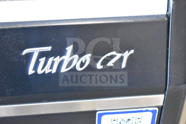 Turbo Air TOM-50SB-N 50" black horizontal air curtain display case, model label shown, 115 volts, 1 phase.