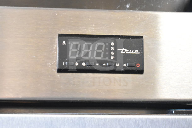 2020 True T-49-HC commercial 2 door reach-in cooler control panel, 115 volts, digital display visible.