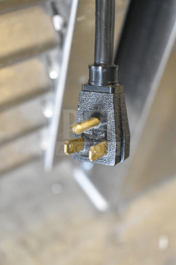Close-up of a power plug for the 2020 True T-49-HC Commercial 2 Door Reach In Cooler, 115V, 1 Phase.