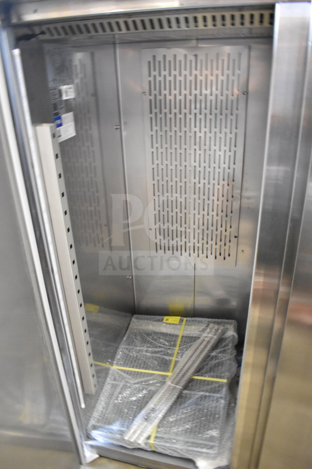 Brand new Avantco 178Z2FHC 54" solid door stainless steel reach-in freezer, 115 volts, 1 phase, interior view.