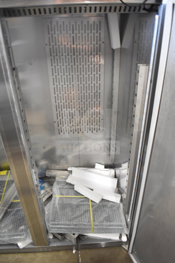Brand new Avantco 178Z2FHC 54" stainless steel reach-in freezer, 2025 model. Visible packaging materials inside.