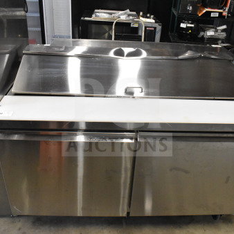 Brand new Avantco 178SSPT6010 commercial sandwich prep table with scratches and dents. Stainless steel, 115V, 1 phase.