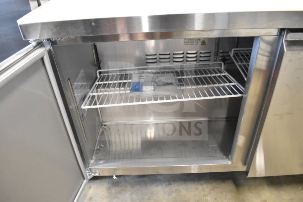BRAND NEW Avantco 178SSPT6010 Commercial Sandwich Prep Table, scratch and dent, stainless steel interior with wire shelf.