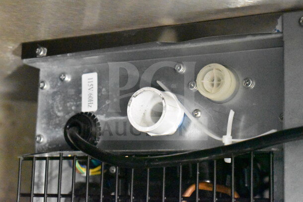 Partial view of Avantco 194EUCG80A undercounter ice machine showing electrical components and label marked "115V/60Hz".