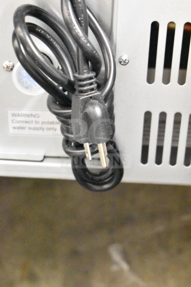 Brand new Avantco 194UN300A undercounter ice machine, 115V, 1 phase, scratch and dent model, full cube ice, visible power cord.