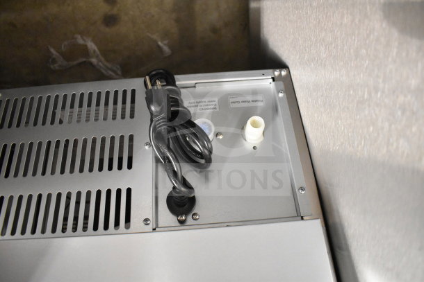 Avantco 194UN300A undercounter ice machine, brand new with minor scratches. 115V, 1 phase, visible power cord and warning label.