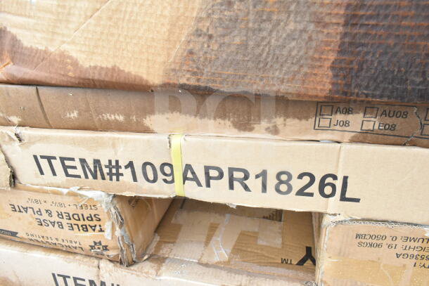 Cardboard boxes labeled "ITEM#109 APR1826L," containing new scratch and dent items like a work table, pan rack, shelves.