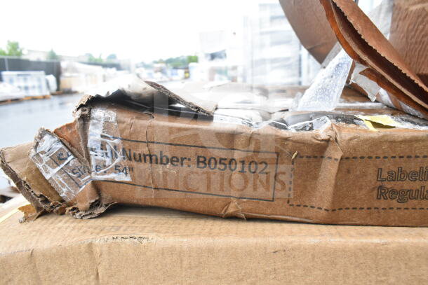 Damaged cardboard box with visible label showing item number B050102. Includes new scratch and dent items such as work table, pan rack, shelves.