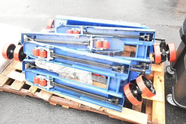 Brand new Lavex 481XN25DF400 manual pallet jack, 17"x35.5", 4,400 lb. capacity, scratch and dent, blue, on a wooden pallet.