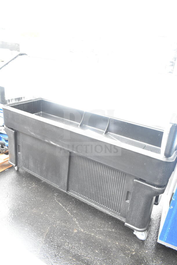 Black portable buffet station, brand new with slight scratches and dents. Features wheels for mobility, spacious design for catering use.