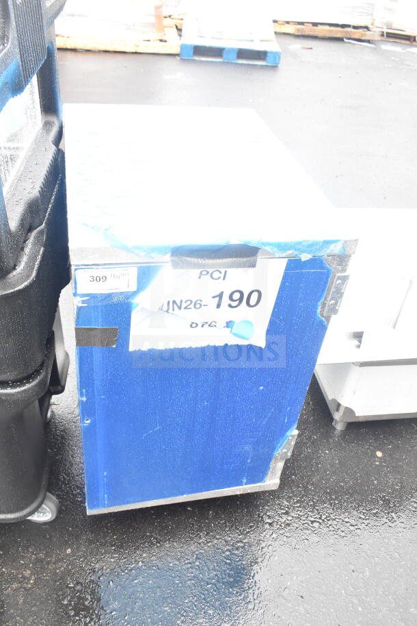 BRAND NEW Regency 600AEC1820 half-height pan rack, enclosed, 20-pan capacity, welded, scratch and dent condition, label "JUN26-190."