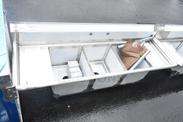 Brand new Steelton 522CS31416LR 66" sink, three compartments, two 12" drainboards, 14"x16"x12" bowls, scratch and dent condition.