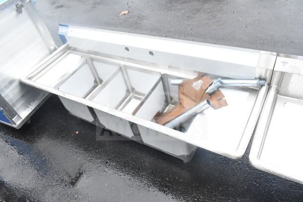 Brand new Steelton 522CS31416LR 66" three-compartment sink with two 12" drainboards and 14"x16"x12" bowls. Scratch and dent condition.