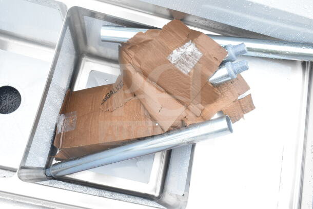 Steelton 66" three compartment sink with scratched surfaces, includes two 12" drainboards, 14"x16"x12" bowls. New, boxed parts.