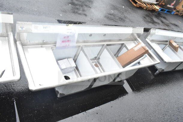 Brand new Steelton 66" three compartment sink with two 12" drainboards, 14" x 16" x 12" bowls, minor scratches.