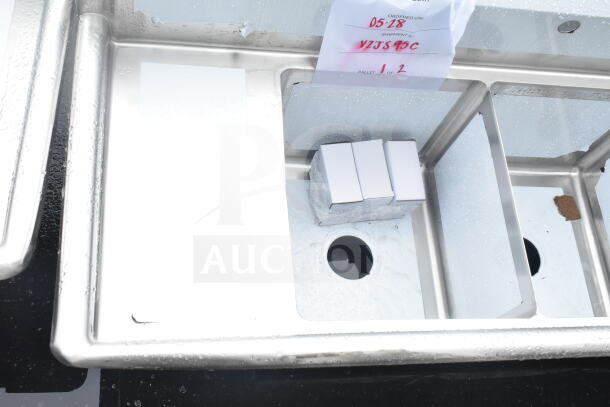 Steelton 522CS31416LR 66" three compartment sink, brand new with minor scratches. Features two 12" drainboards, 14" x 16" x 12" bowls.