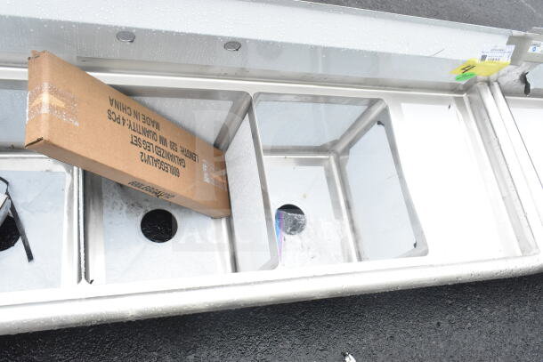 Steelton 522CS31416LR 66" three-compartment sink, brand new with minor scratches, two 12" drainboards, and 14" x 16" x 12" bowls.