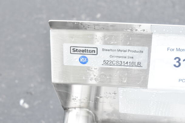 Steelton 522CS31416LR three compartment sink, 66", with two 12" drainboards, 14"x16"x12" bowls. Steel, new scratch and dent.