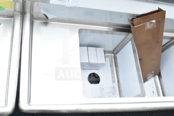 alt="Steelton 66-inch three-compartment sink with two 12-inch drainboards, brand new scratch and dent condition."