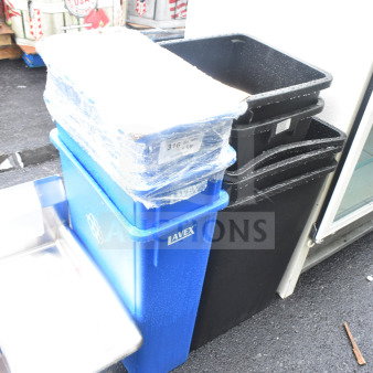Eight new scratch and dent trash cans, including Lavex Slim Jim. Features stacked design, visible labels.
