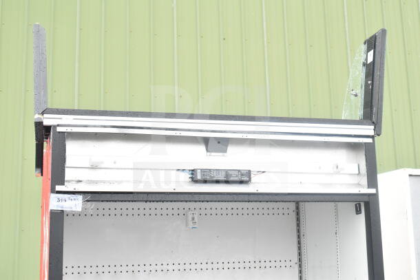 True TAC-48 Commercial Merchandiser, reach-in, grab-and-go style, 208-230V, 1 phase, visible labeling on unit.