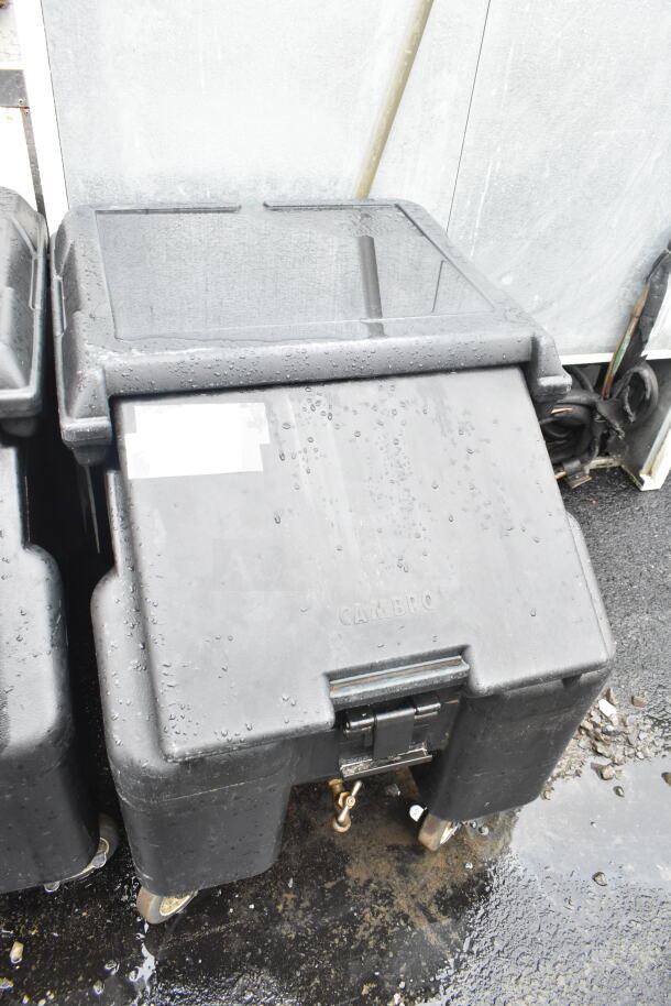 Cambro black poly portable ice bin with commercial casters, new with minor scratches.