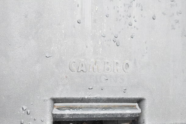 Cambro black poly portable ice bin, brand new with minor scratches, on commercial casters, embossed logo visible.