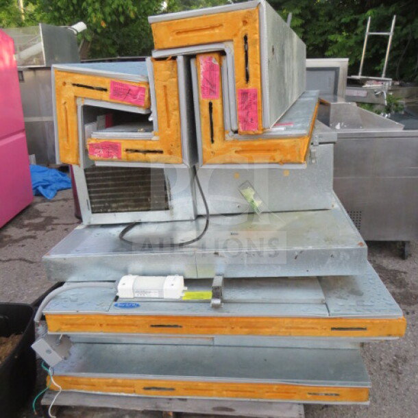 Norlake 4x6 self-contained walk-in cooler with floor. Appears used; shows installation parts. Labels visible on edges.