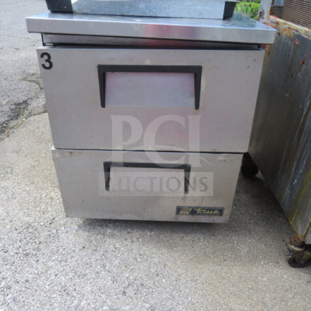 True 2 Drawer Worktop Freezer, Model TUC-27F-D-2, stainless steel, used condition, 27.5x30x34 inches, 115 Volt.