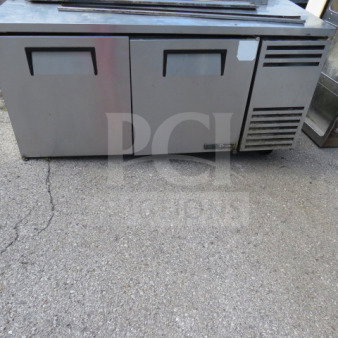 True 2 Door Freezer, model TWT-67F-HC, with 3 racks and casters. Measures 67x32x39 inches. 115 Volt. Used condition.