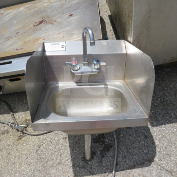 Krowne stainless steel hand sink with faucet, model HS-26. Features backsplash, side splashes, and dual-lever faucet.